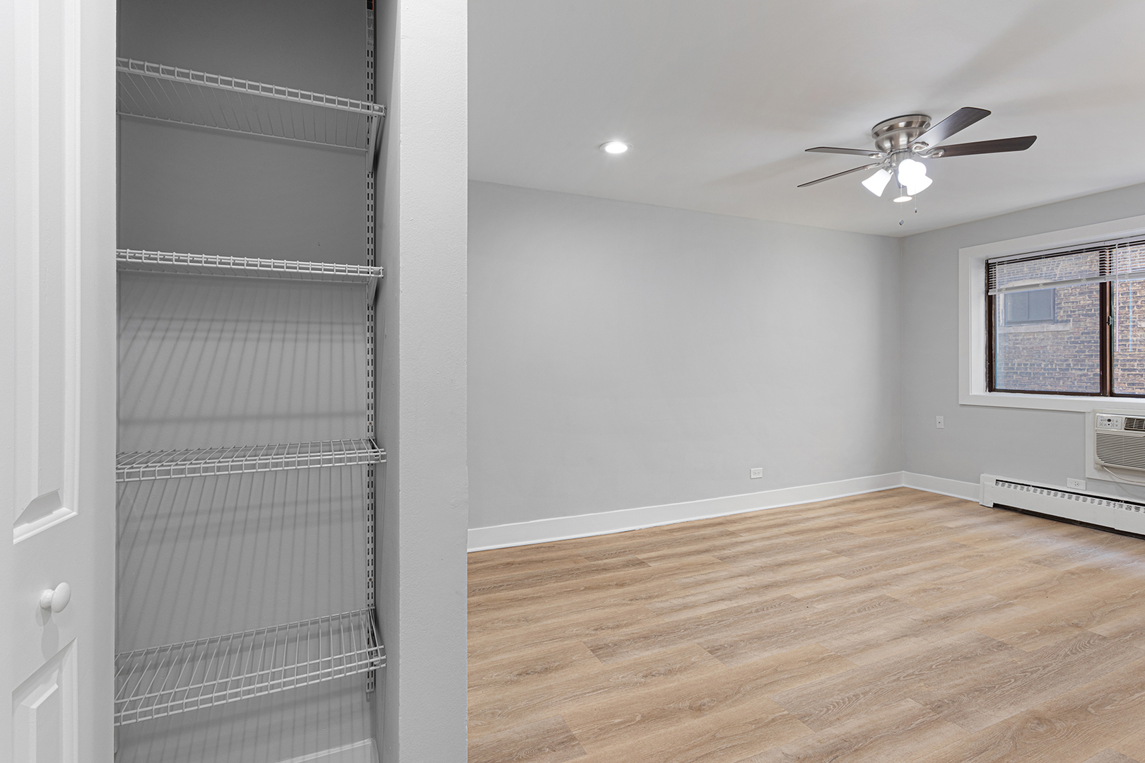 5534 North Kenmore Avenue, Unit 206 Chicago, IL 60640 - Photo 8 of 13 a view of an empty room with wooden floor and a window