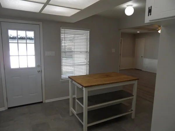 a room with a bed and a window