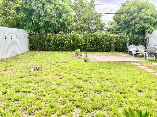 a swimming pool with an outdoor space