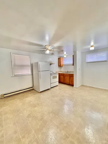 a view of a livingroom with a furniture