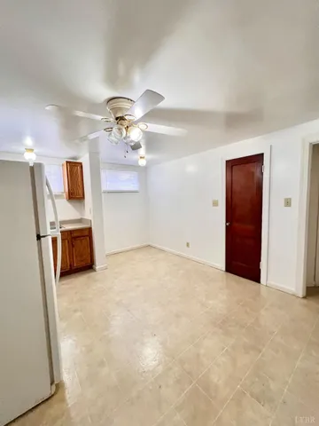 a view of a kitchen with a sink cabinets and window