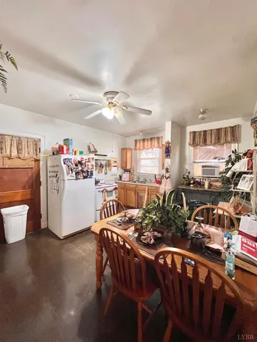 a view of a hallway and dining room