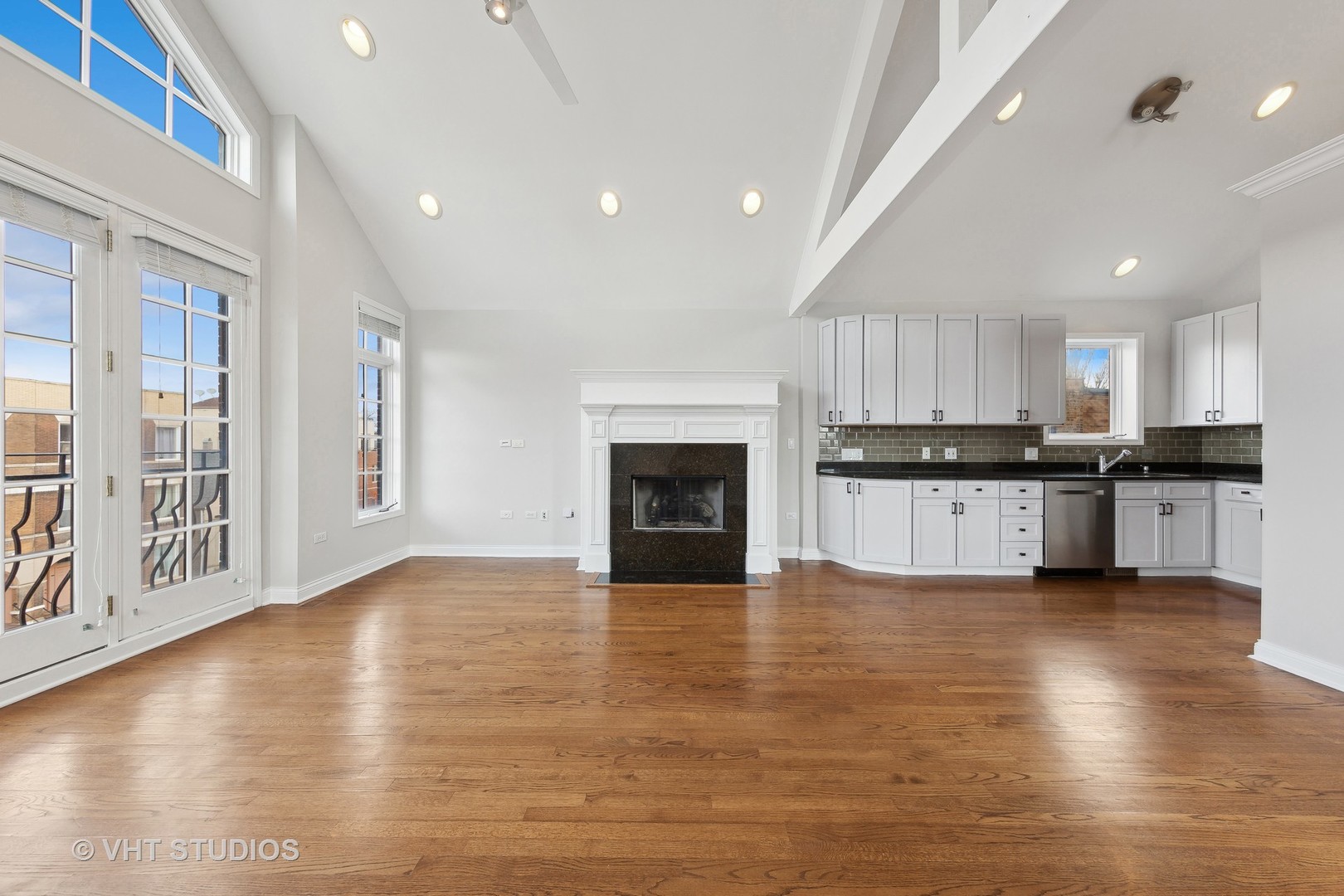 2031 West Augusta Boulevard, Unit 3 Chicago, IL 60622 - Photo 5 of 24 a view of kitchen with granite countertop stainless steel appliances and a counter top space