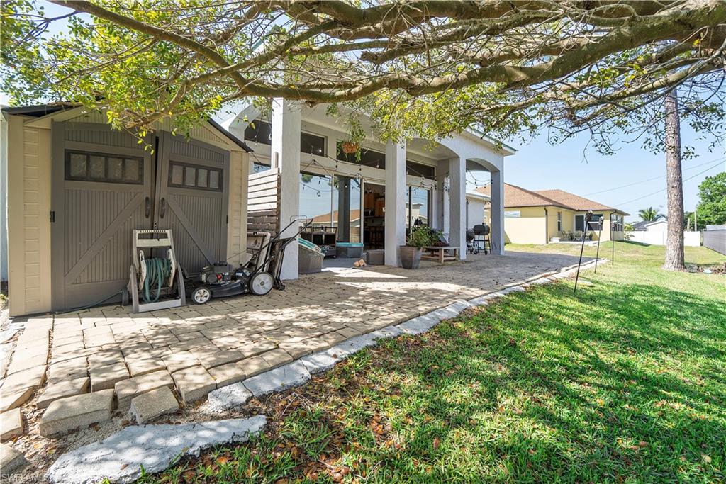 8081 Kansas Road Fort Myers, FL 33967 - Photo 16 of 21 a view of a house with a yard