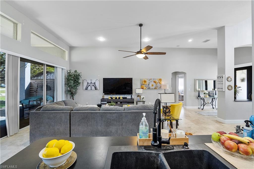 8081 Kansas Road Fort Myers, FL 33967 - Photo 21 of 21 a view of a livingroom with furniture and a flat screen tv