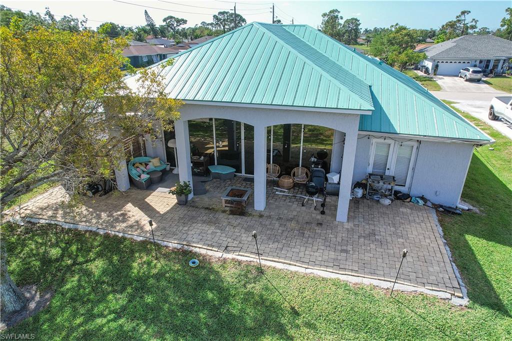 8081 Kansas Road Fort Myers, FL 33967 - Photo 6 of 21 a view of a house with backyard and sitting area