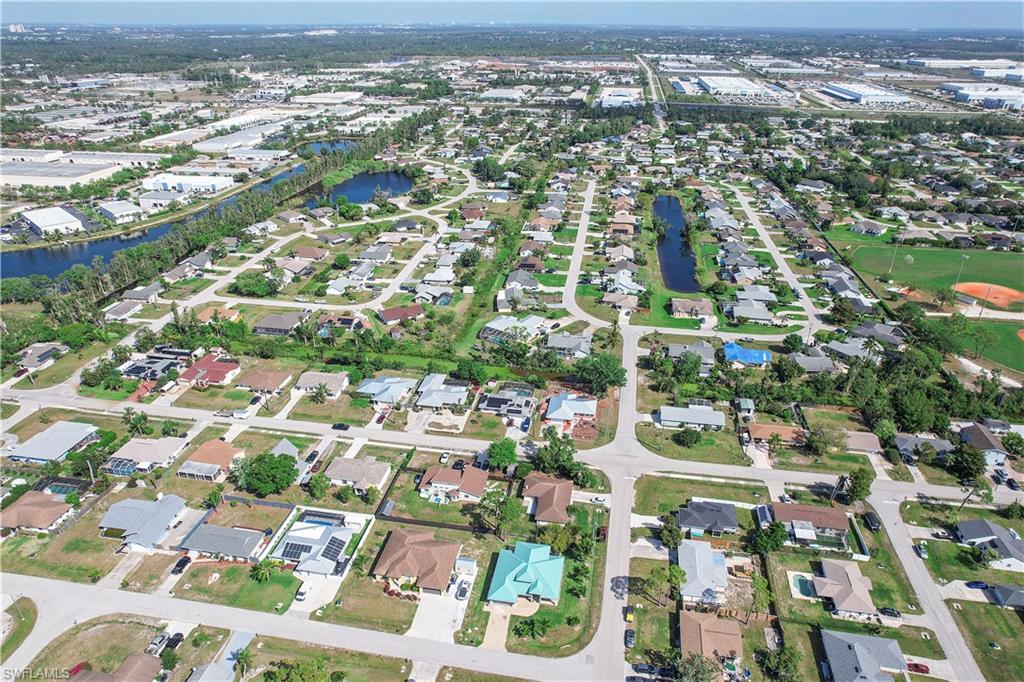 8081 Kansas Road Fort Myers, FL 33967 - Photo 7 of 21 an aerial view of residential houses with outdoor space