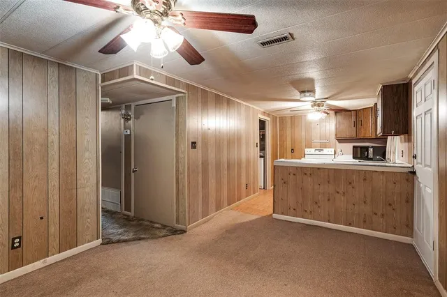 a view of a kitchen with a sink and cabinet area
