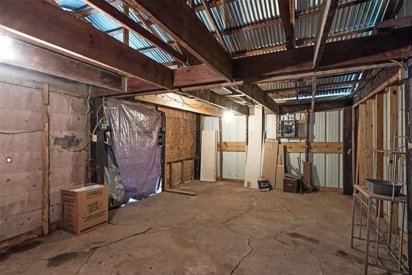 a view of backyard with cabin