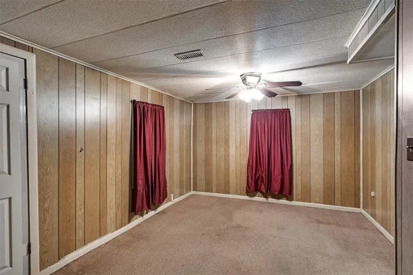 a view of a hallway with red walls