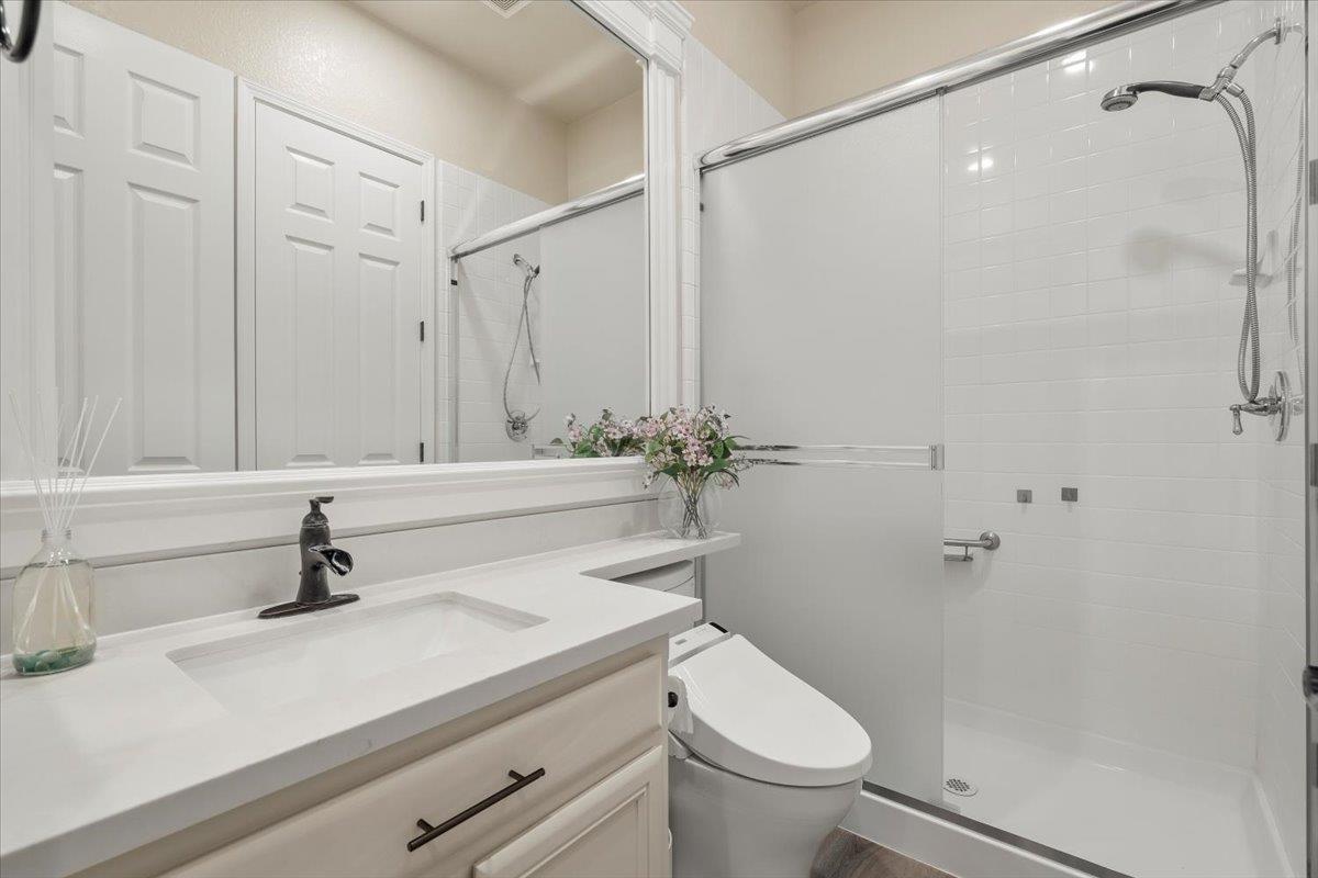 1935 St Andrews Circle Gilroy, CA 95020 - Photo 31 of 84 a bathroom with a sink a toilet and shower