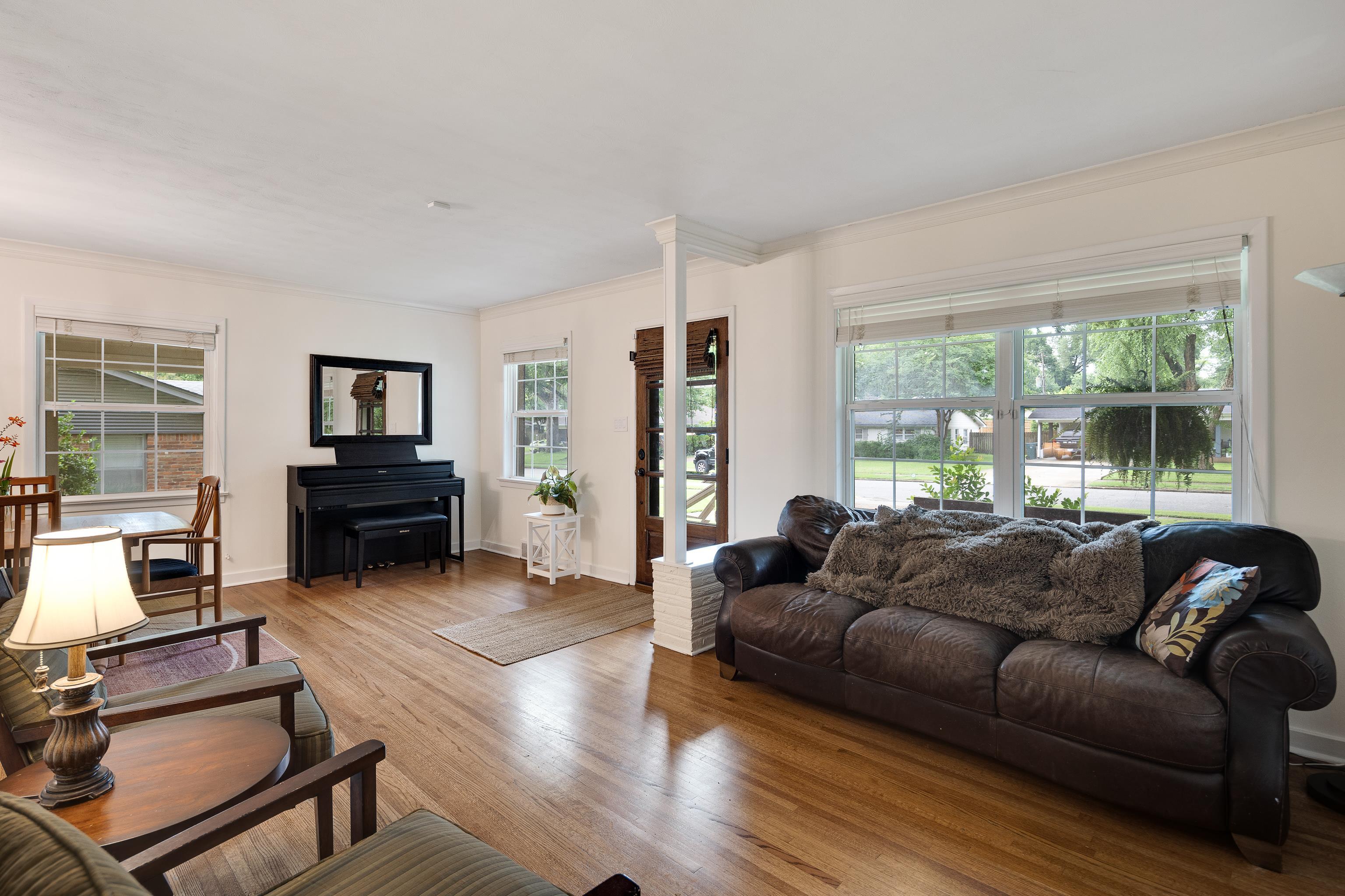 4152 Barfield Road Memphis, TN 38117 - Photo 8 of 37 Living area featuring ornamental molding and wood finished floors