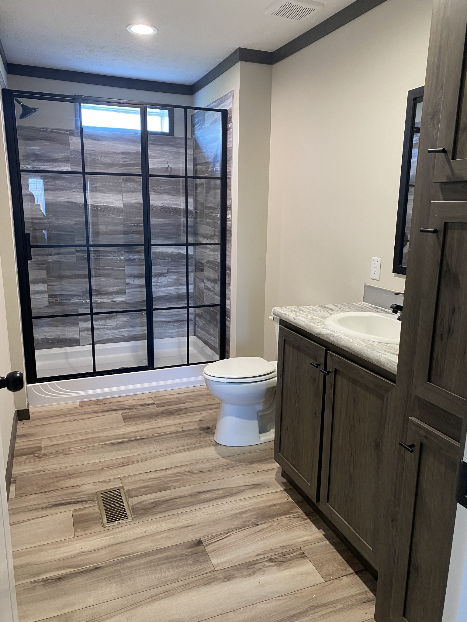 1646 Gamaliel Road Red Boiling Springs, TN 37150 - Photo 13 of 24 a bathroom with a sink toilet and shower