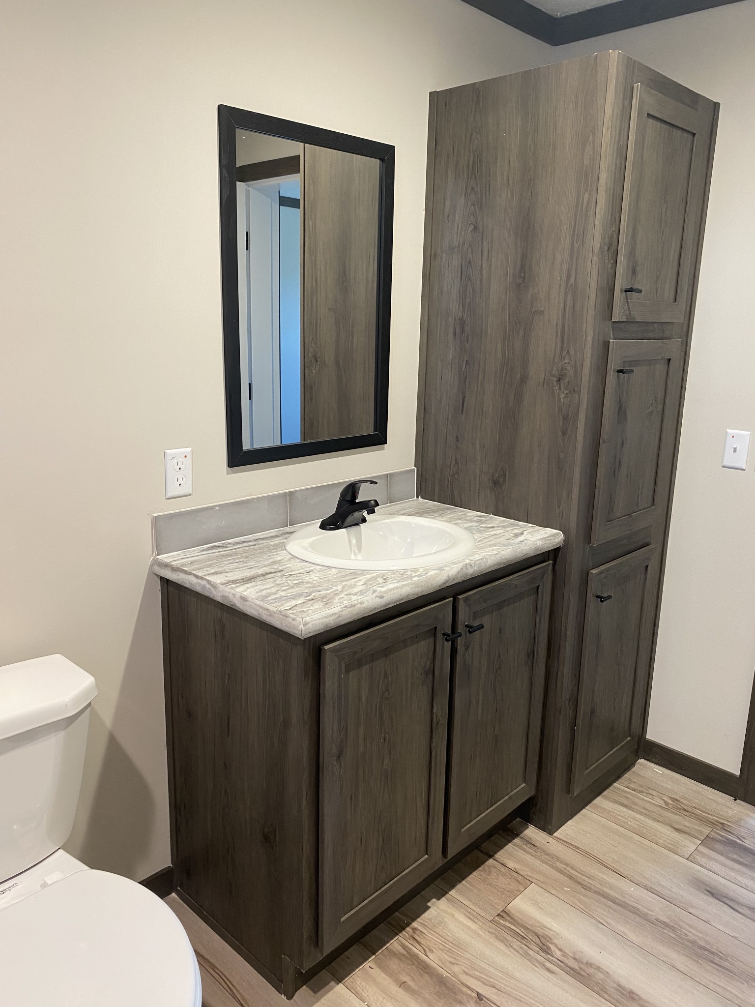 1646 Gamaliel Road Red Boiling Springs, TN 37150 - Photo 14 of 24 a bathroom with a sink and a mirror