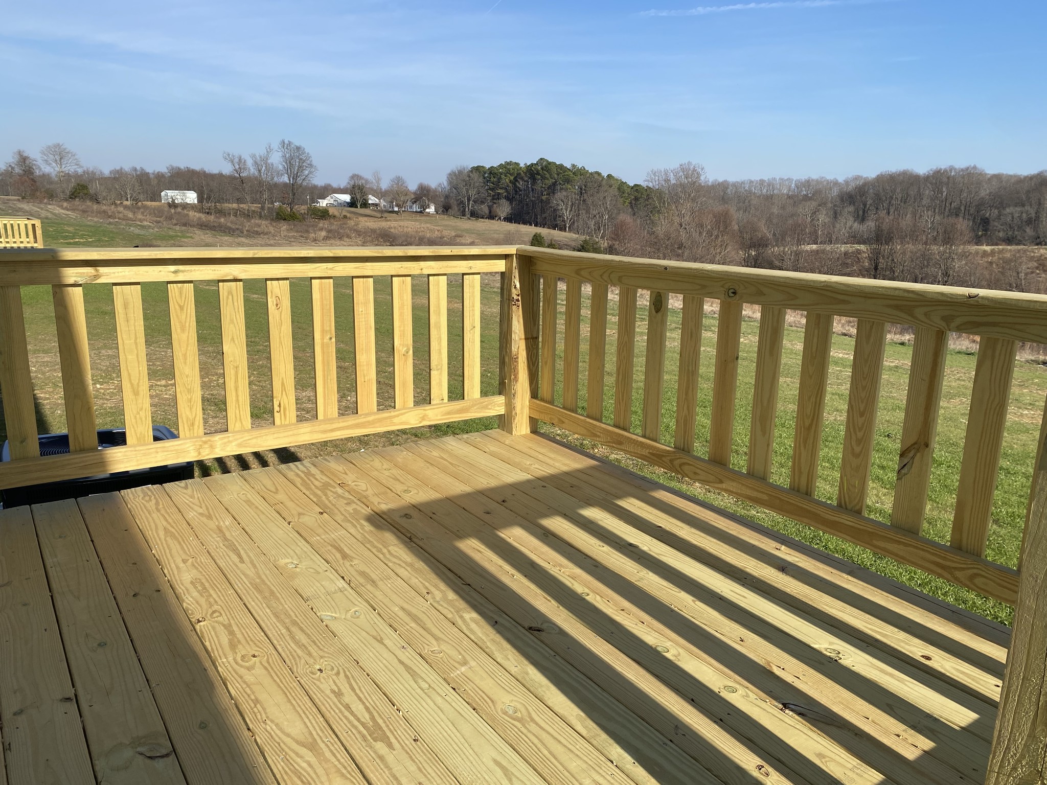 1646 Gamaliel Road Red Boiling Springs, TN 37150 - Photo 20 of 24 a view of a balcony with wooden floor and fence