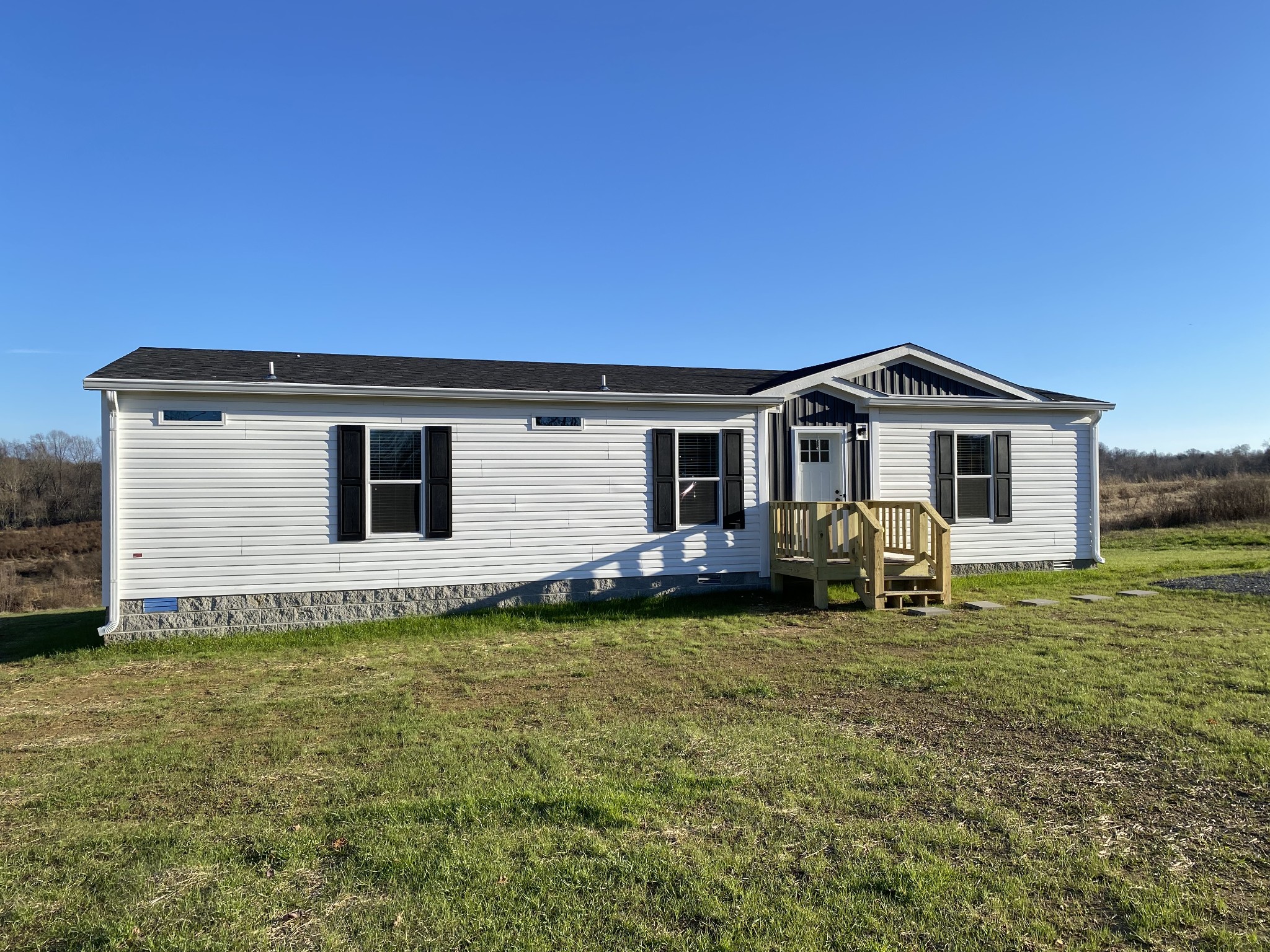 1646 Gamaliel Road Red Boiling Springs, TN 37150 - Photo 3 of 24 a backyard of a house with table and chairs