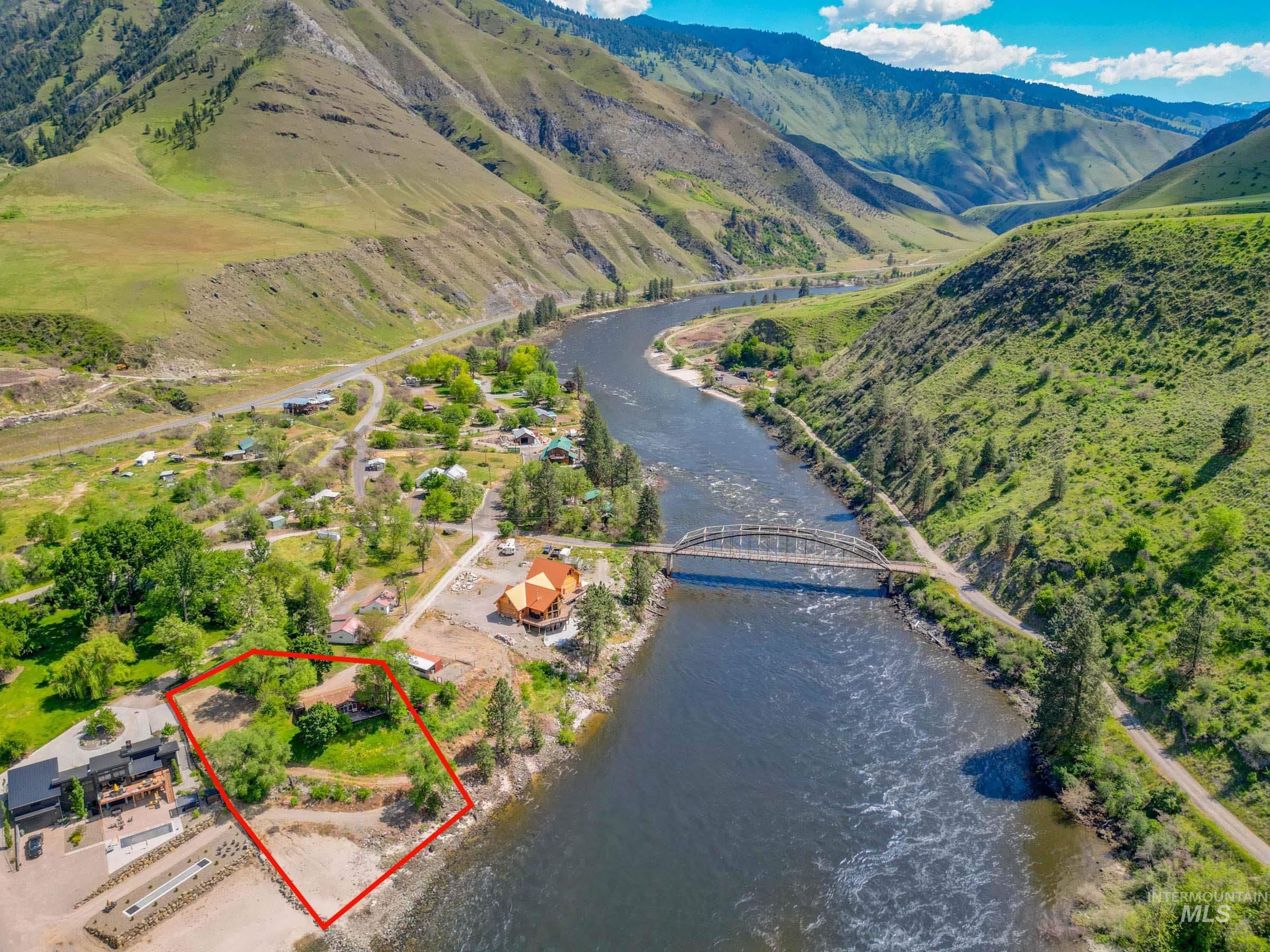 151 Cow Creek Road Lucile, ID 83542 - Photo 50 of 50 Riverfront property framed by a red outline, featuring mature trees and direct access to the water