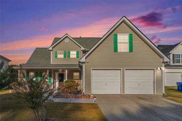front view of a house with a yard