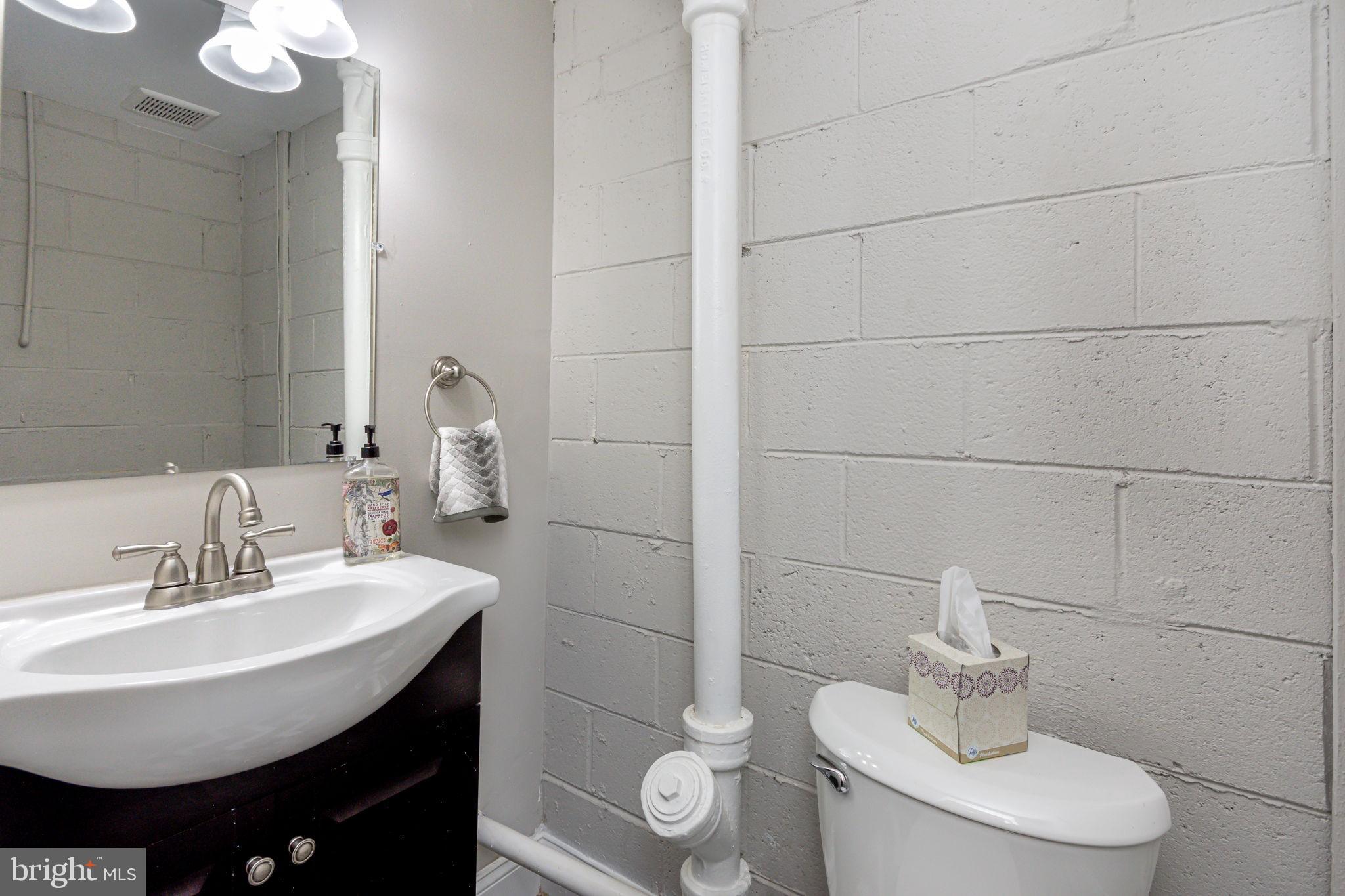 4402 Fenor Road Baltimore, MD 21227 - Photo 21 of 25 Half-bath downstairs