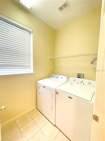 a view of outdoor space with deck and yard