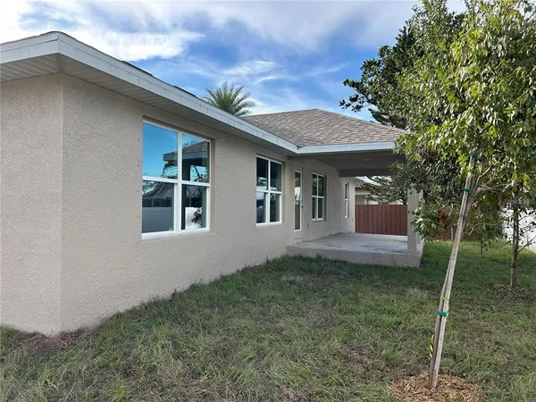 a house with trees in front of it