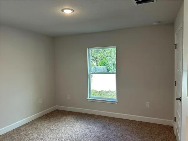 an empty room with a window