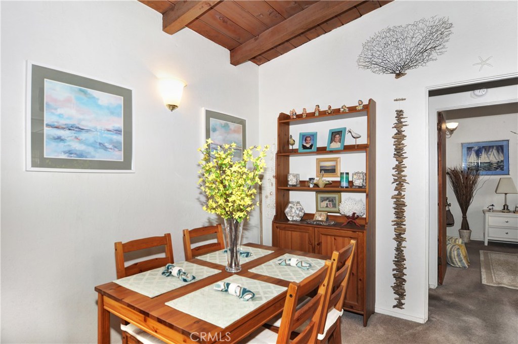 217 10th Street, Unit 4 Seal Beach, CA 90740 - Photo 31 of 45 a view of a workspace with furniture