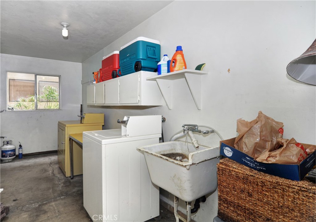 217 10th Street, Unit 4 Seal Beach, CA 90740 - Photo 44 of 45 a room with furniture and a wooden floor