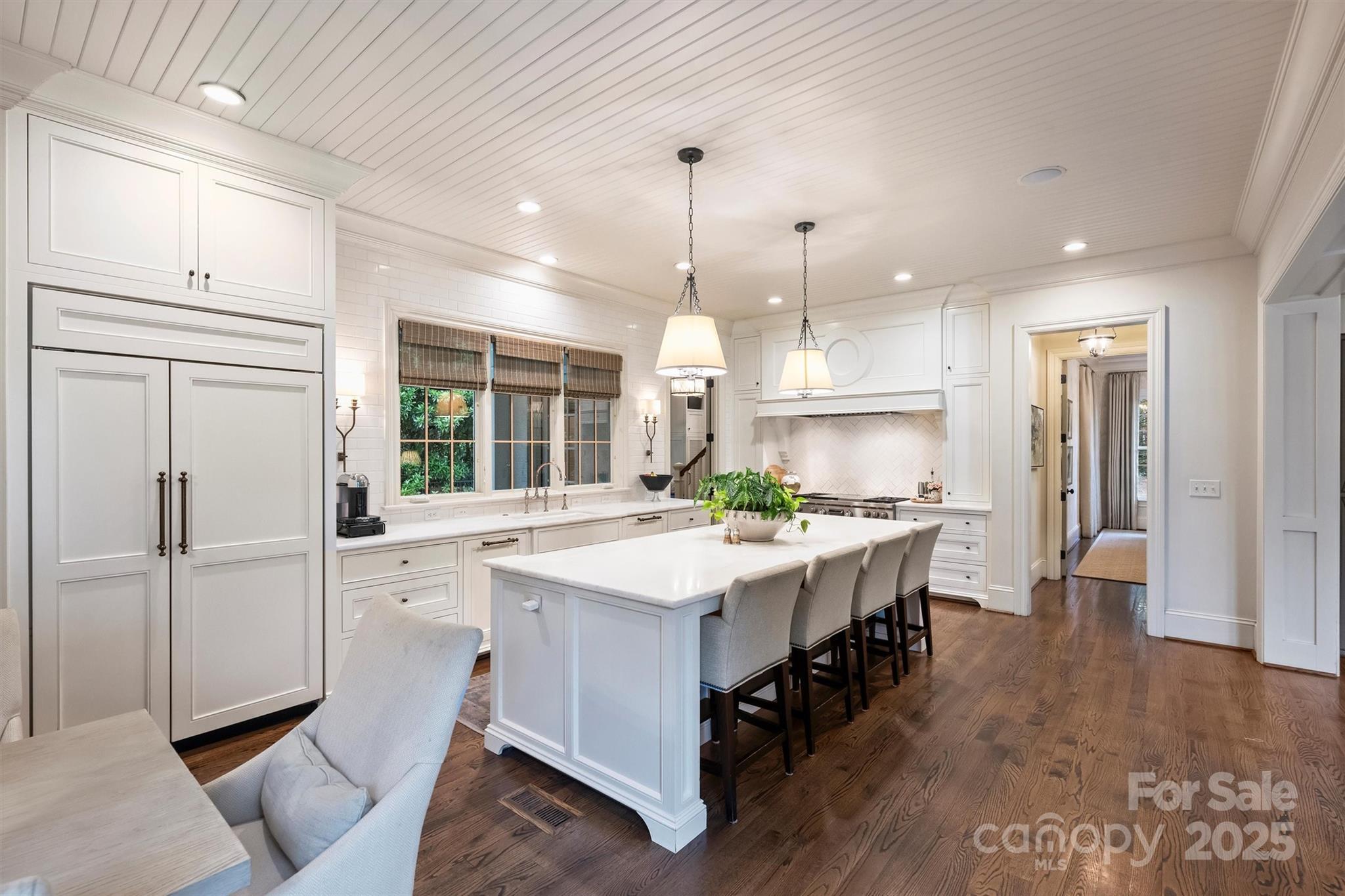 3950 Abingdon Road Charlotte, NC 28211 - Photo 12 of 43 a kitchen with kitchen island a sink stove and refrigerator