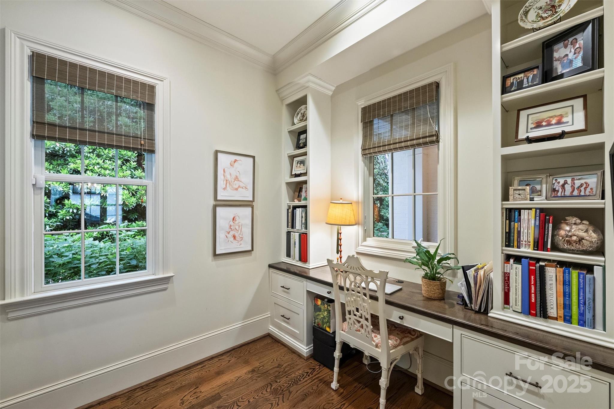 3950 Abingdon Road Charlotte, NC 28211 - Photo 15 of 43 a room with furniture and a book shelf