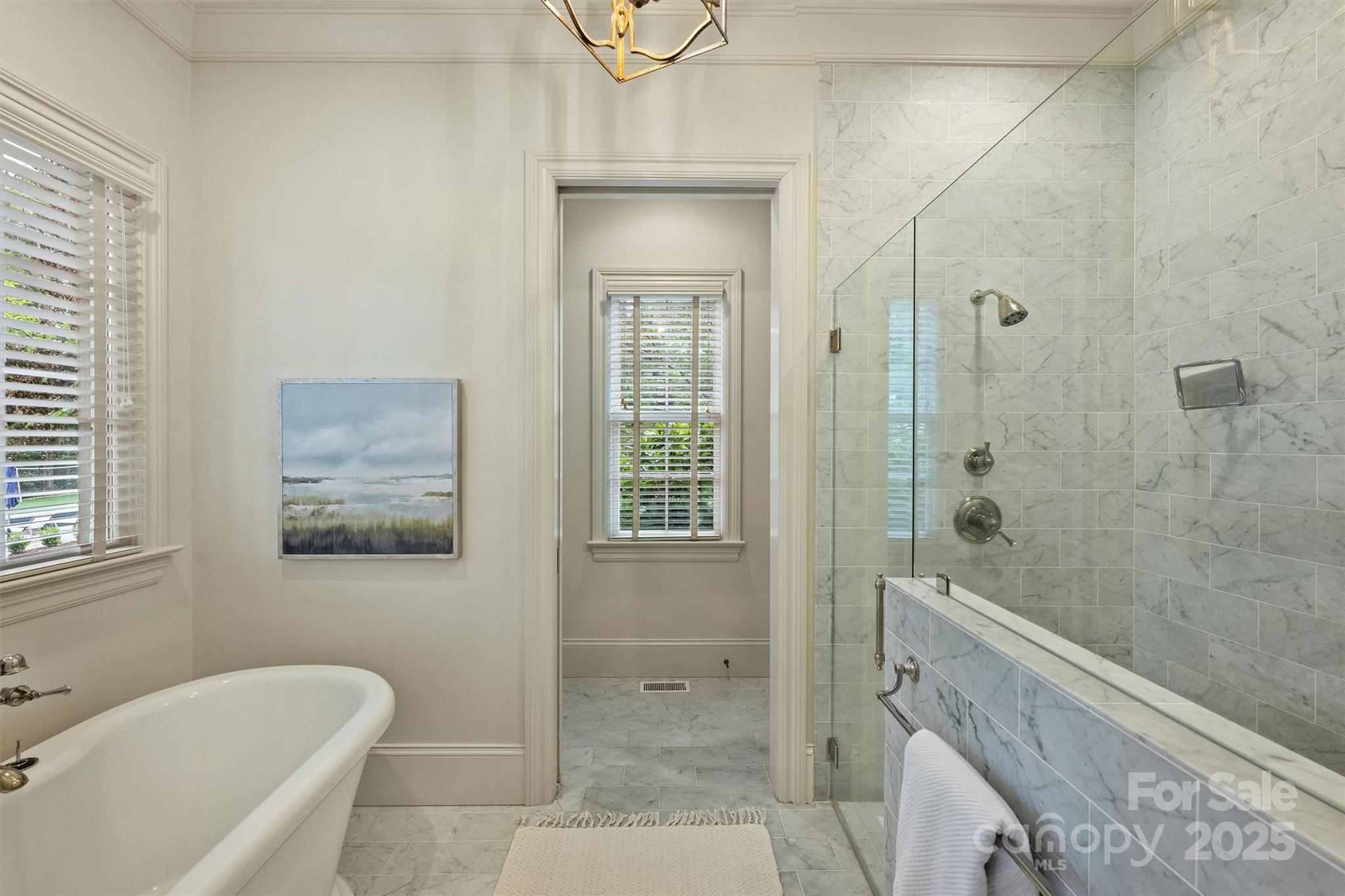 3950 Abingdon Road Charlotte, NC 28211 - Photo 18 of 43 a bathroom with a bathtub and shower