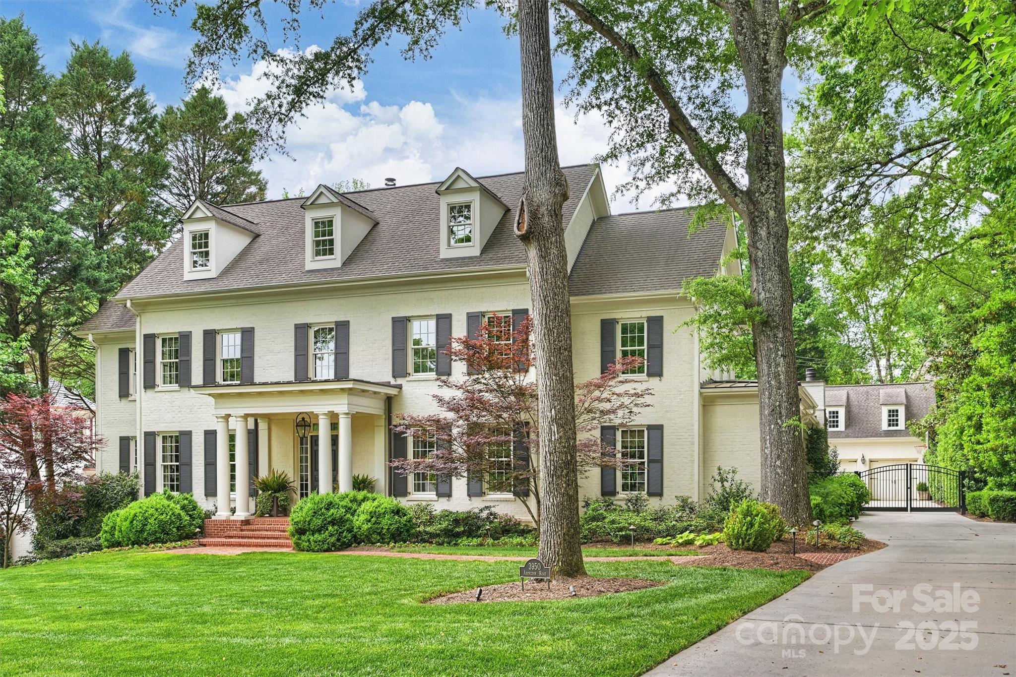 3950 Abingdon Road Charlotte, NC 28211 - Photo 2 of 43 front view of a house with a yard