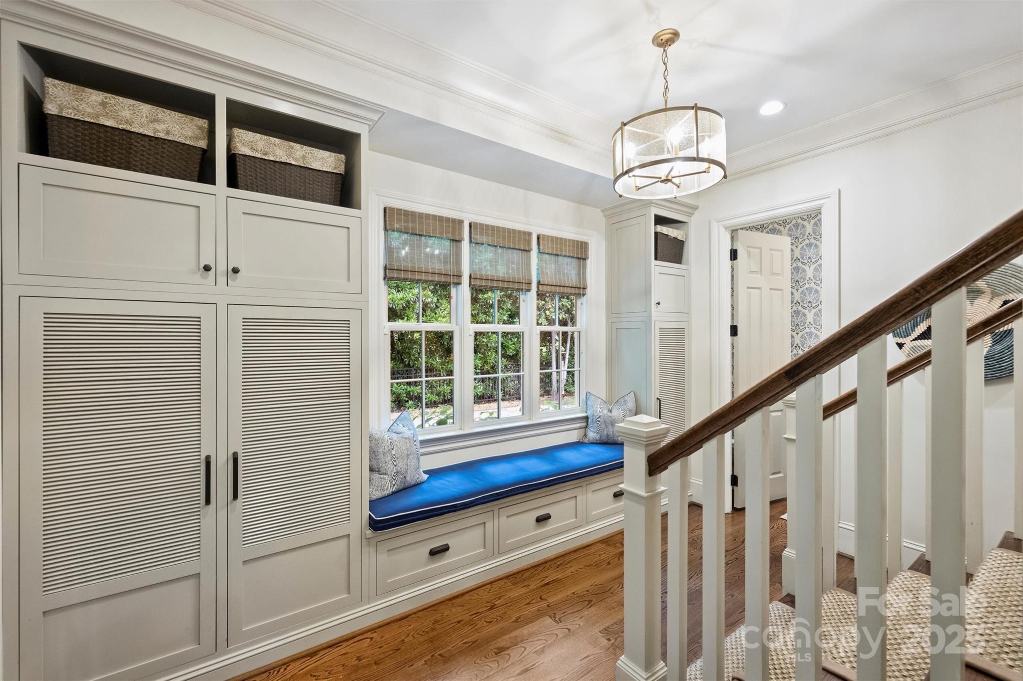 3950 Abingdon Road Charlotte, NC 28211 - Photo 22 of 43 a view of entryway with wooden floor and staircase