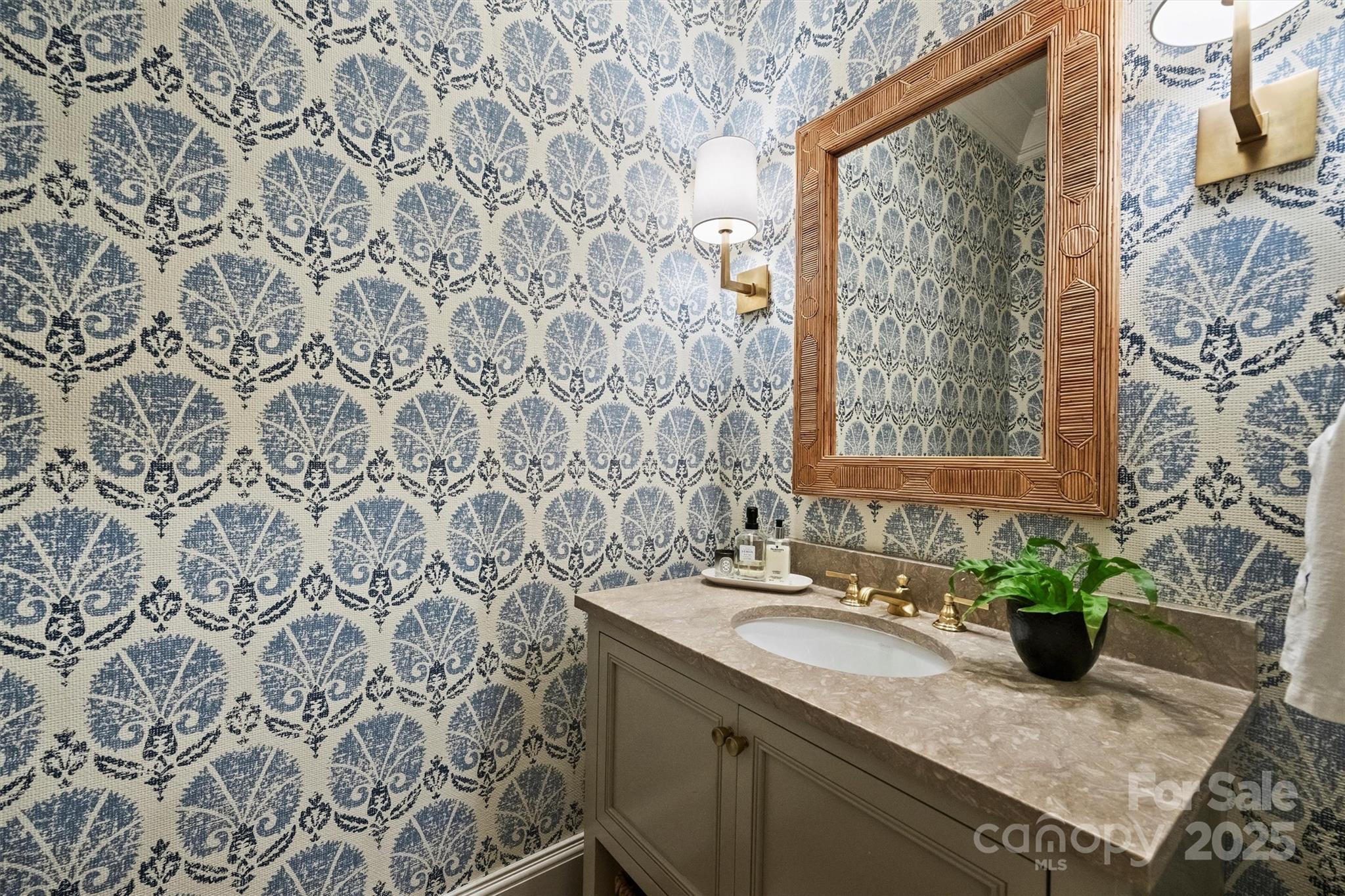 3950 Abingdon Road Charlotte, NC 28211 - Photo 23 of 43 a bathroom with a granite countertop sink a mirror and a shower