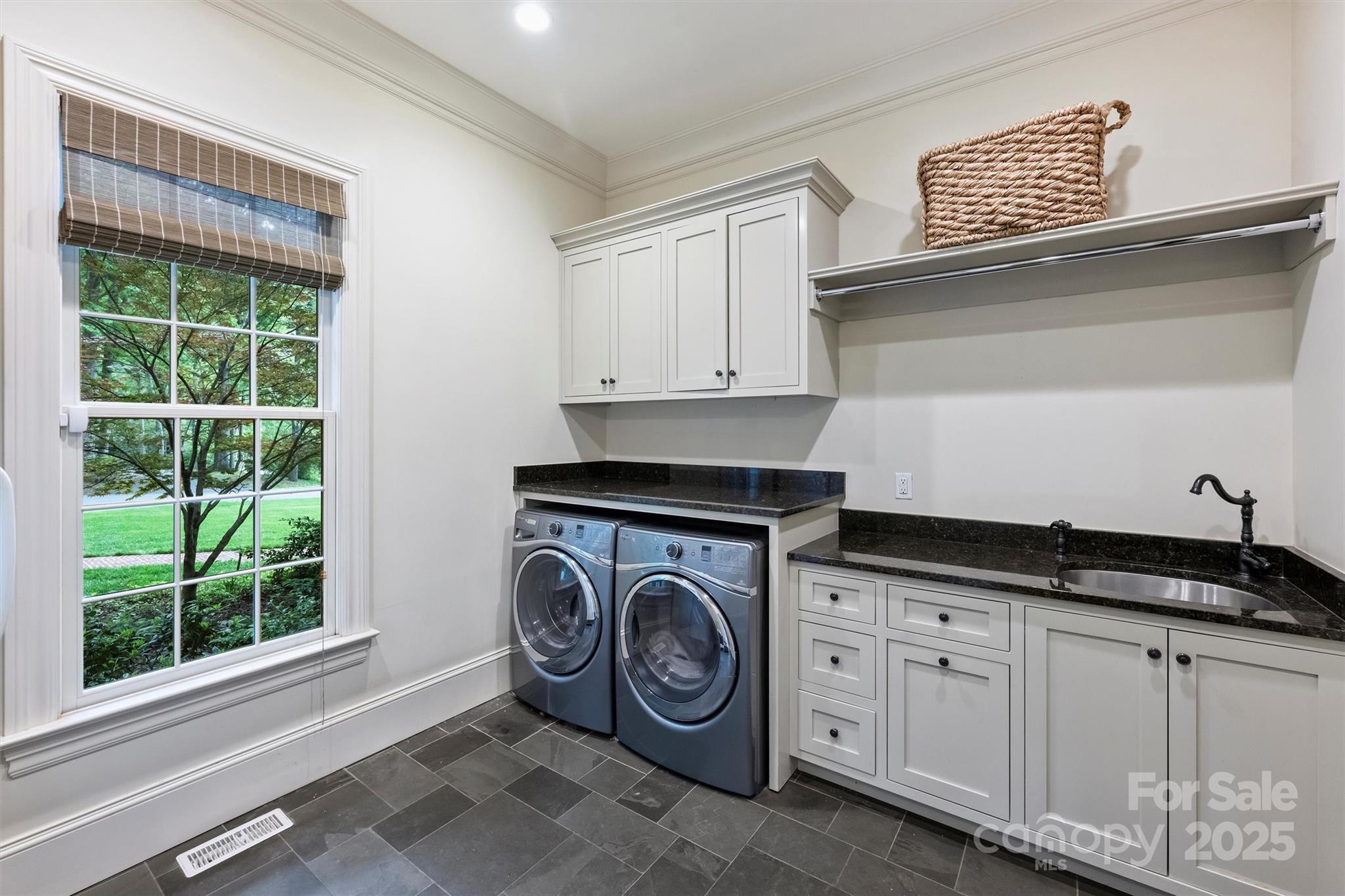 3950 Abingdon Road Charlotte, NC 28211 - Photo 24 of 43 a utility room with sink dryer and washer