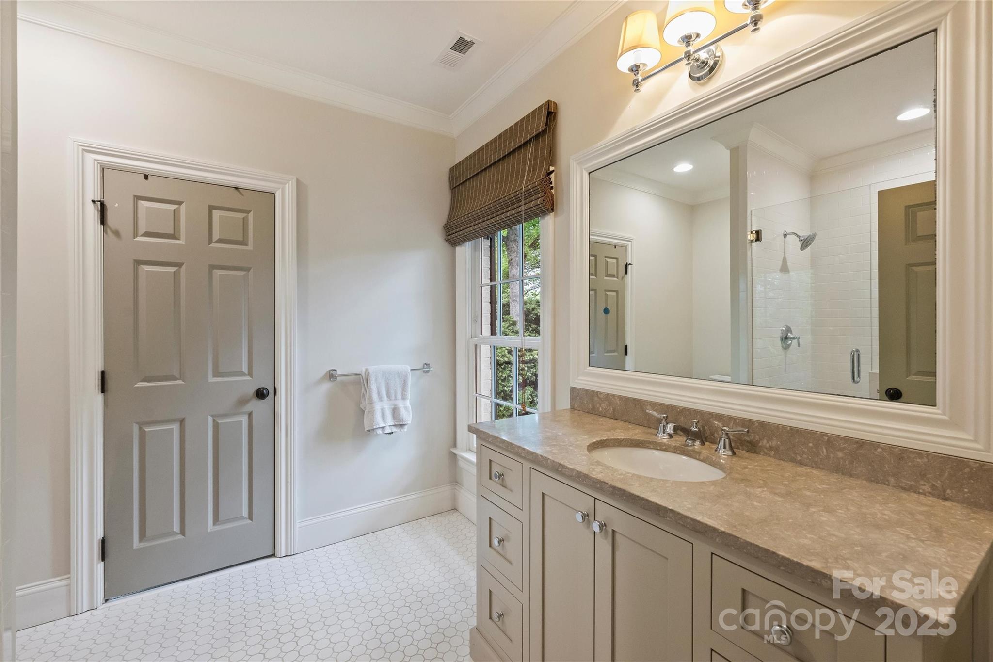 3950 Abingdon Road Charlotte, NC 28211 - Photo 29 of 43 a bathroom with a granite countertop sink mirror and double