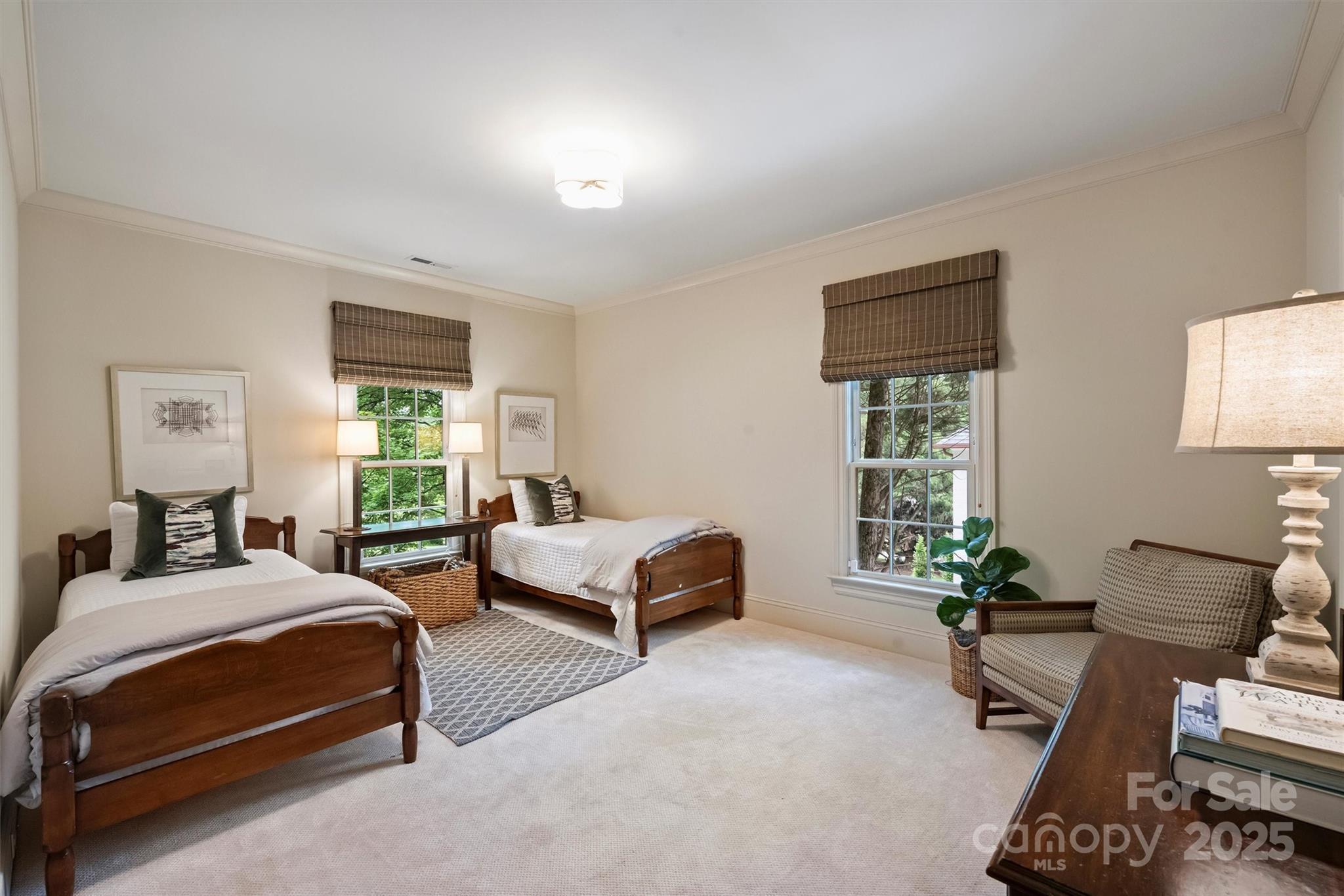 3950 Abingdon Road Charlotte, NC 28211 - Photo 34 of 43 a spacious bedroom with a bed and a couch