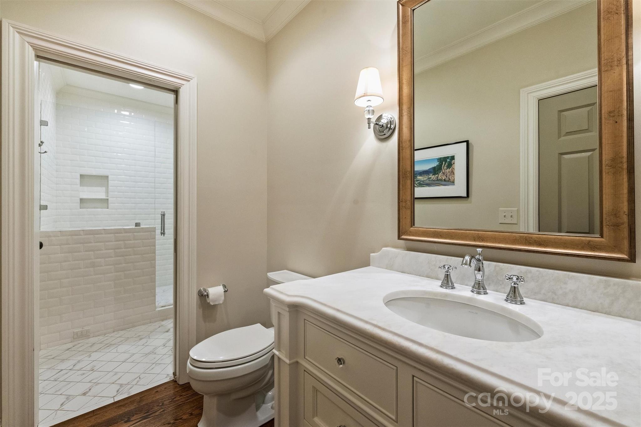 3950 Abingdon Road Charlotte, NC 28211 - Photo 35 of 43 a bathroom with a sink toilet and shower