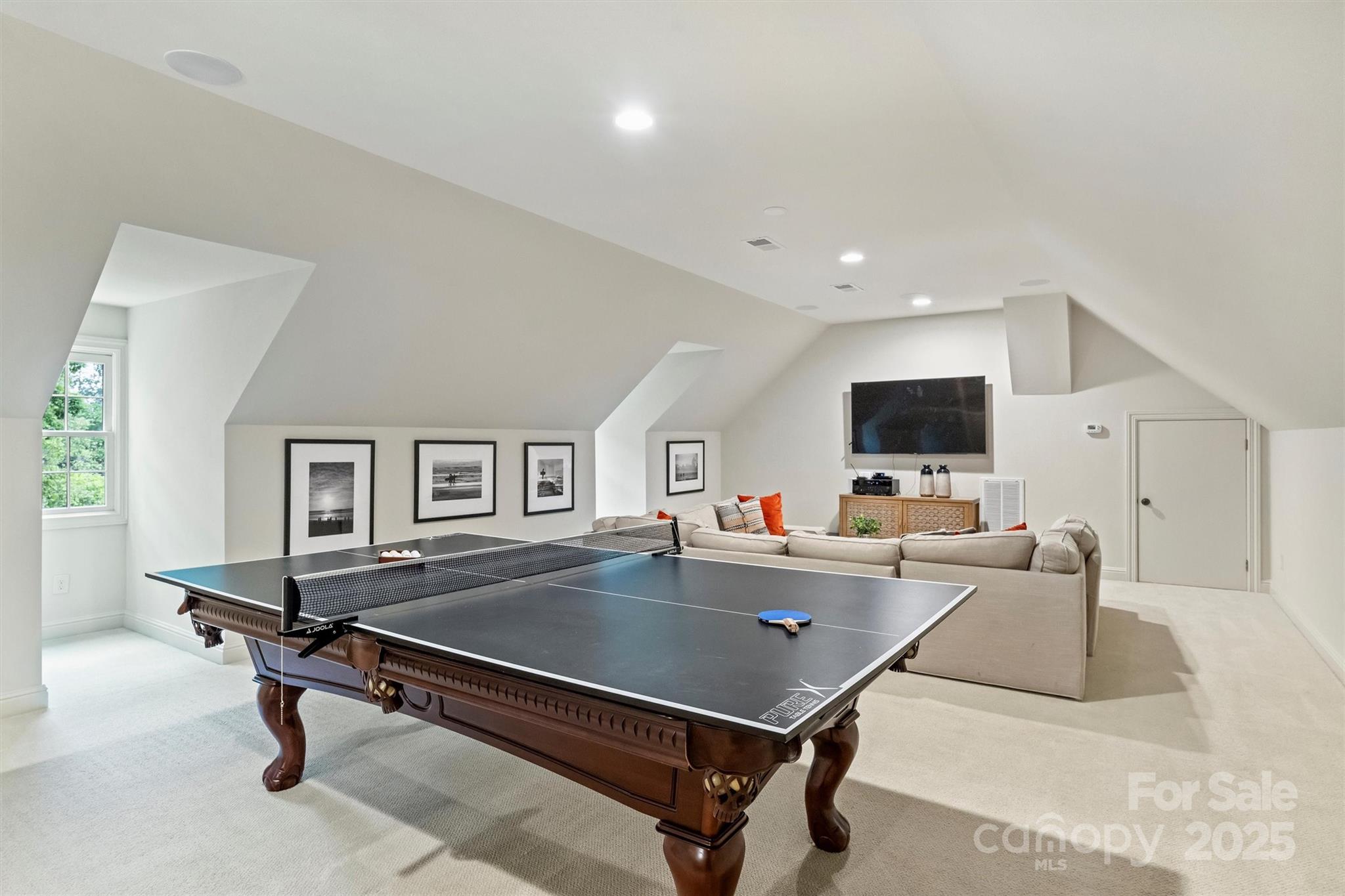3950 Abingdon Road Charlotte, NC 28211 - Photo 36 of 43 a living room with furniture pool table and a flat screen tv