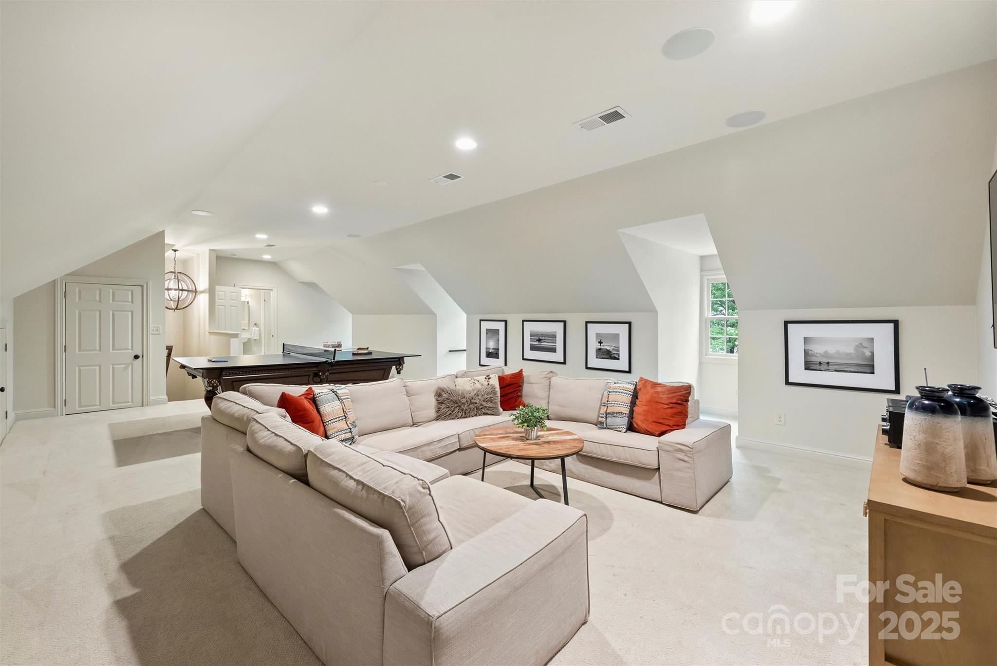 3950 Abingdon Road Charlotte, NC 28211 - Photo 37 of 43 a living room with furniture and a flat screen tv