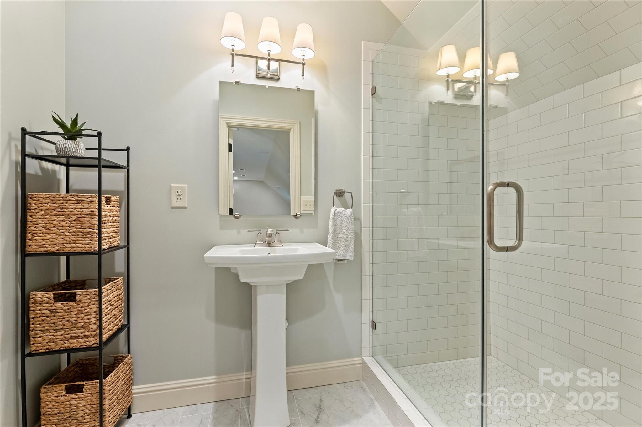 3950 Abingdon Road Charlotte, NC 28211 - Photo 38 of 43 a bathroom with a sink a mirror and shower