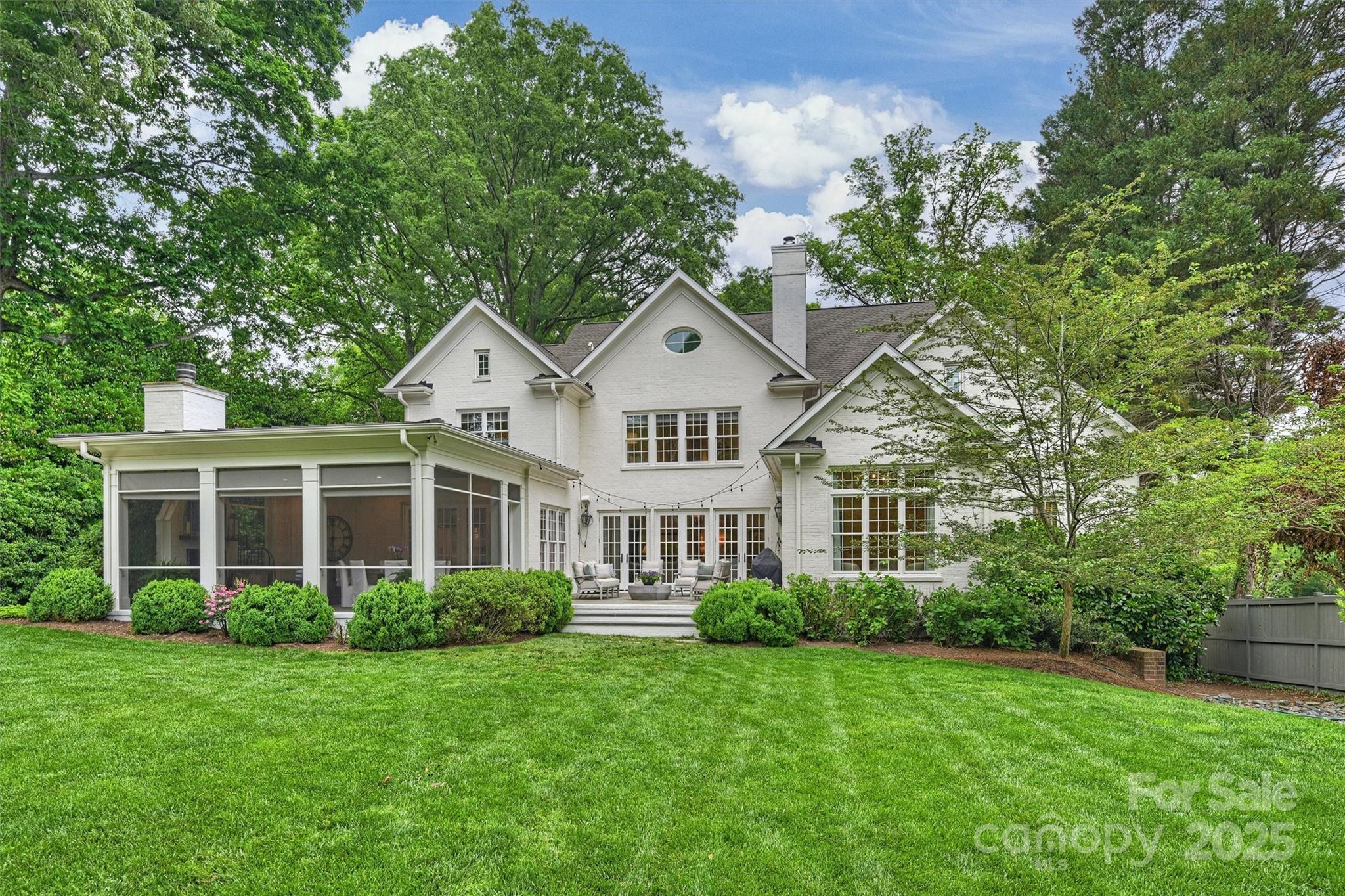 3950 Abingdon Road Charlotte, NC 28211 - Photo 40 of 43 a front view of a house with a yard and trees