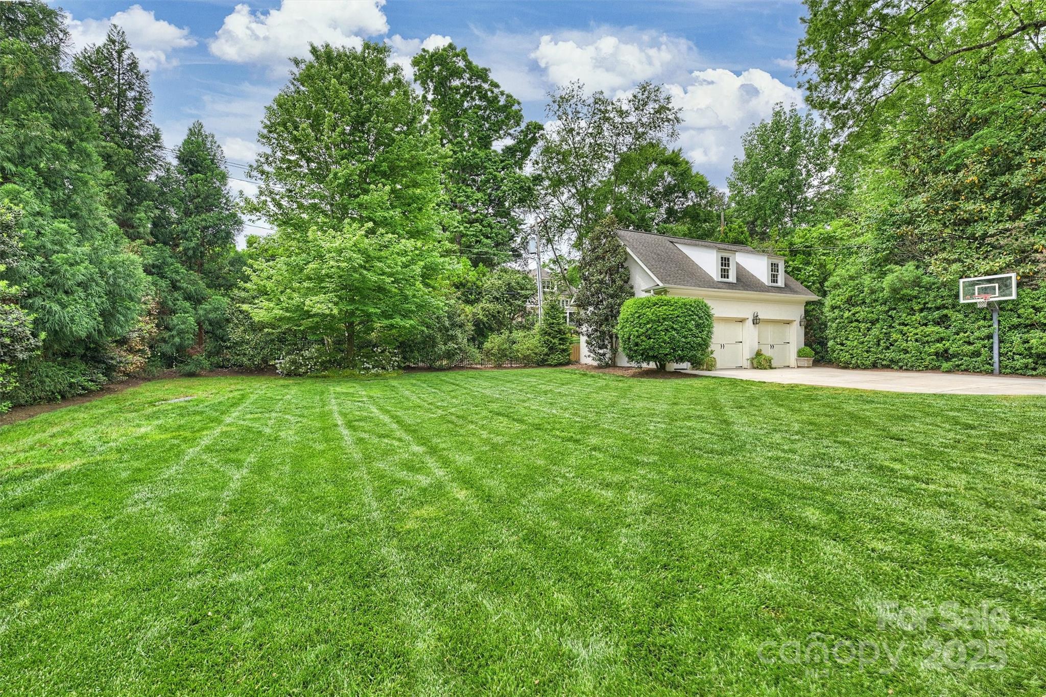 3950 Abingdon Road Charlotte, NC 28211 - Photo 42 of 43 a view of a house with a yard
