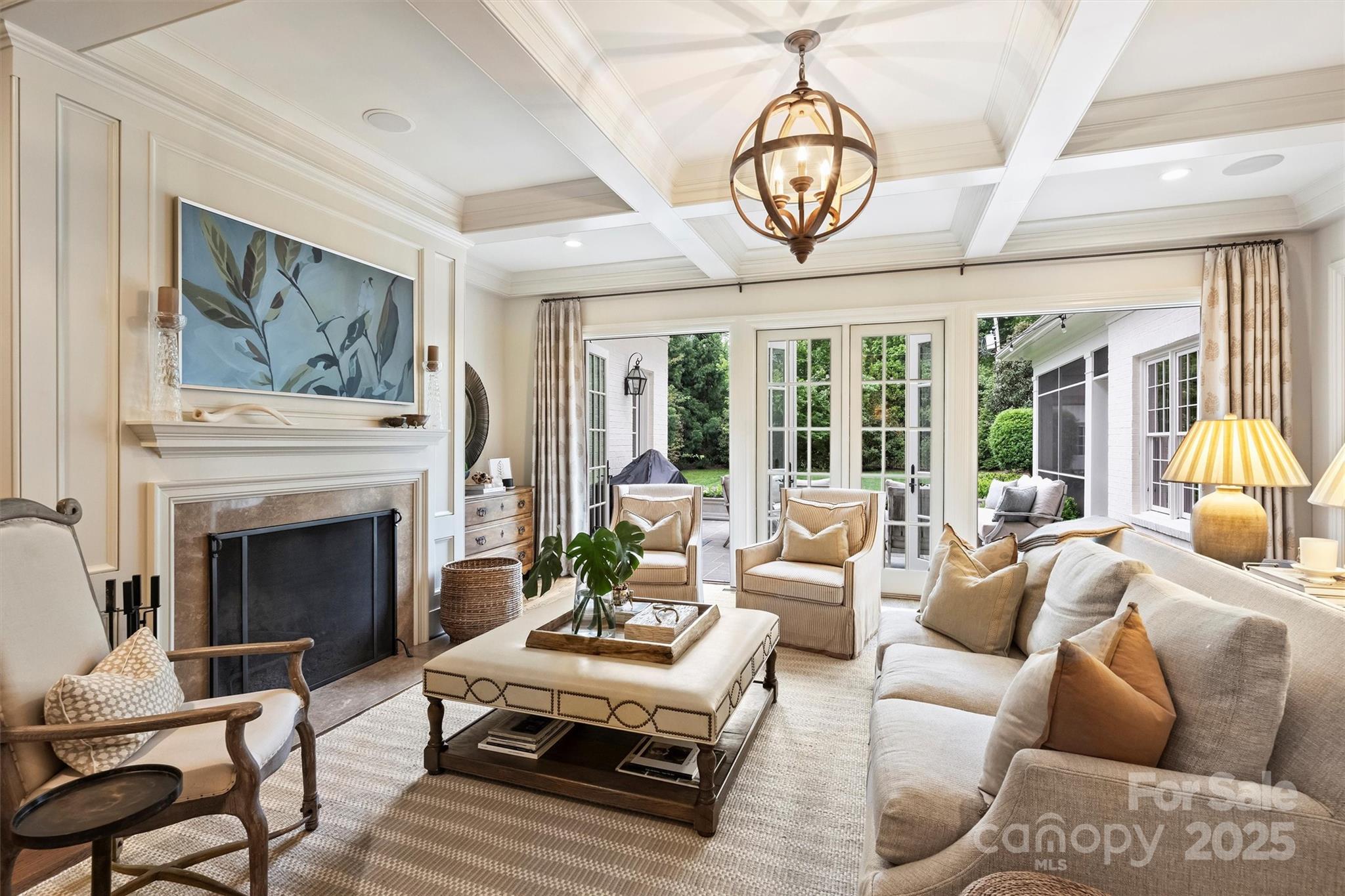 3950 Abingdon Road Charlotte, NC 28211 - Photo 9 of 43 a living room with furniture a fireplace and a floor to ceiling window