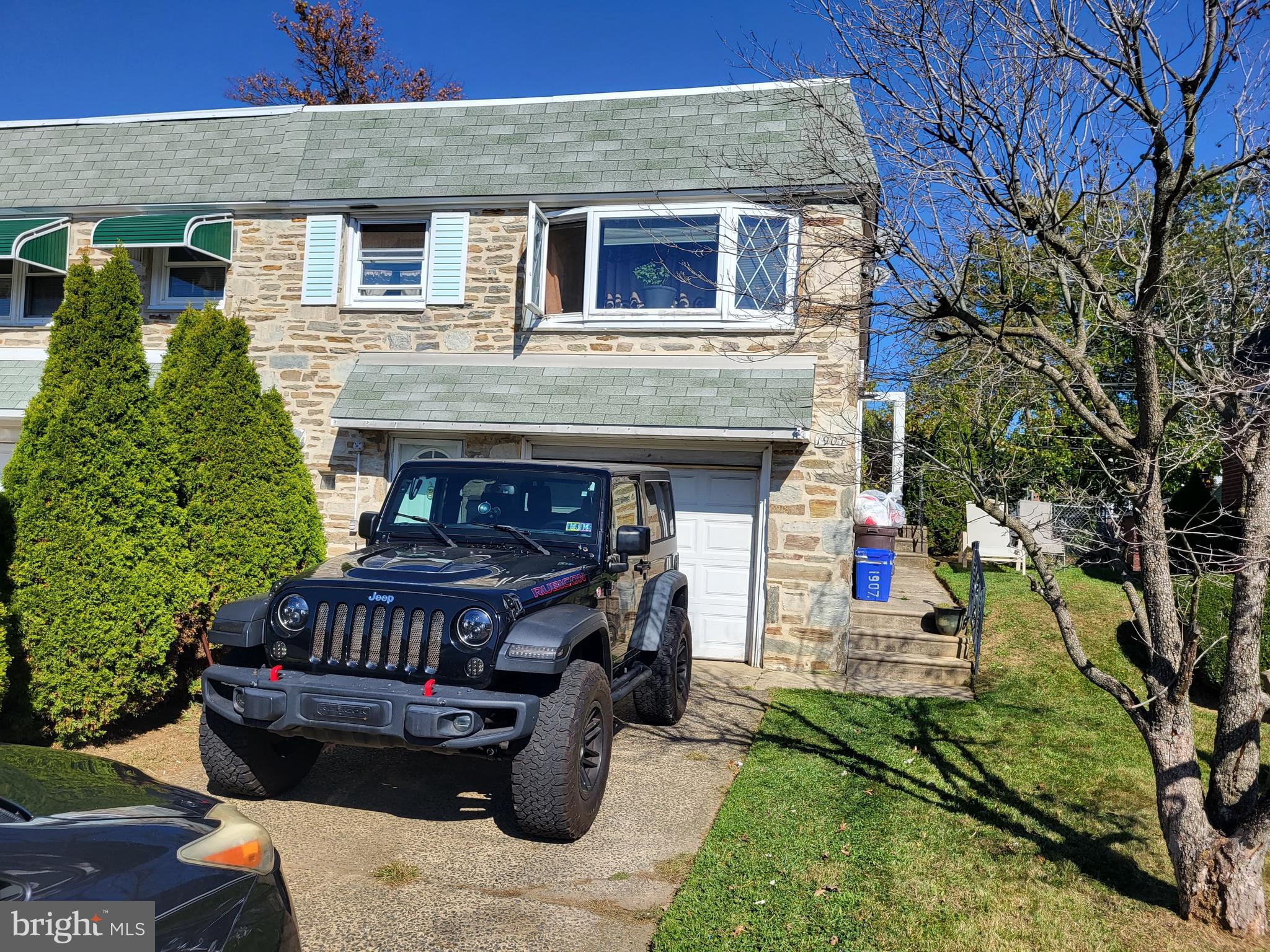 1907 Nester Street Philadelphia, PA 19115 - Photo 1 of 16 a front view of a house with garden
