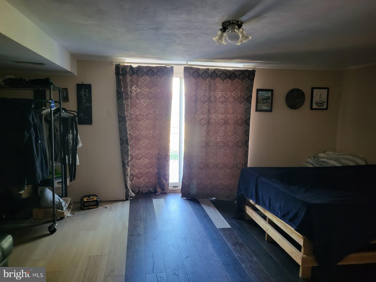1907 Nester Street Philadelphia, PA 19115 - Photo 14 of 16 walk in closet with wooden floor