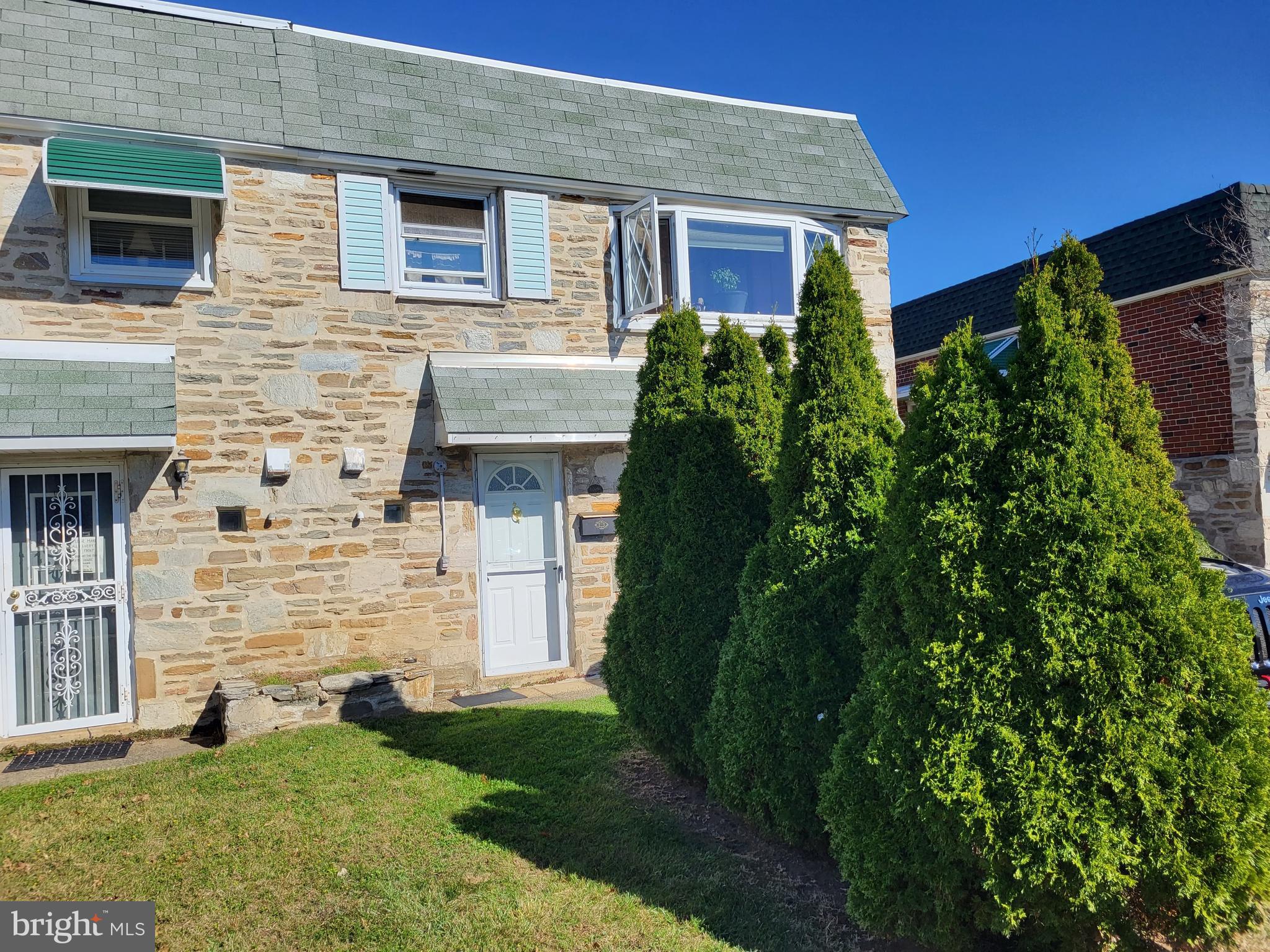 1907 Nester Street Philadelphia, PA 19115 - Photo 3 of 16 a front view of a house with a yard