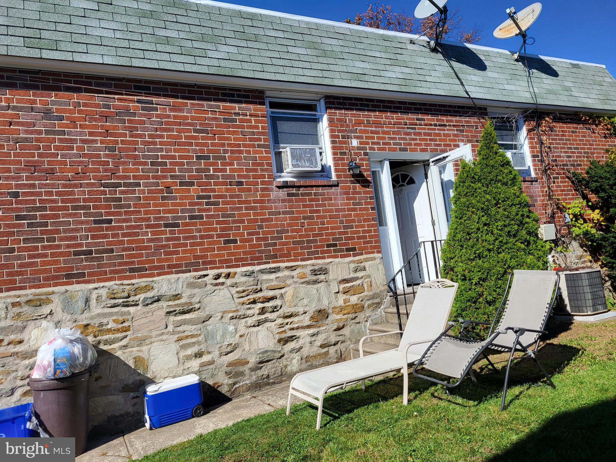 1907 Nester Street Philadelphia, PA 19115 - Photo 4 of 16 a front view of a house with outdoor seating