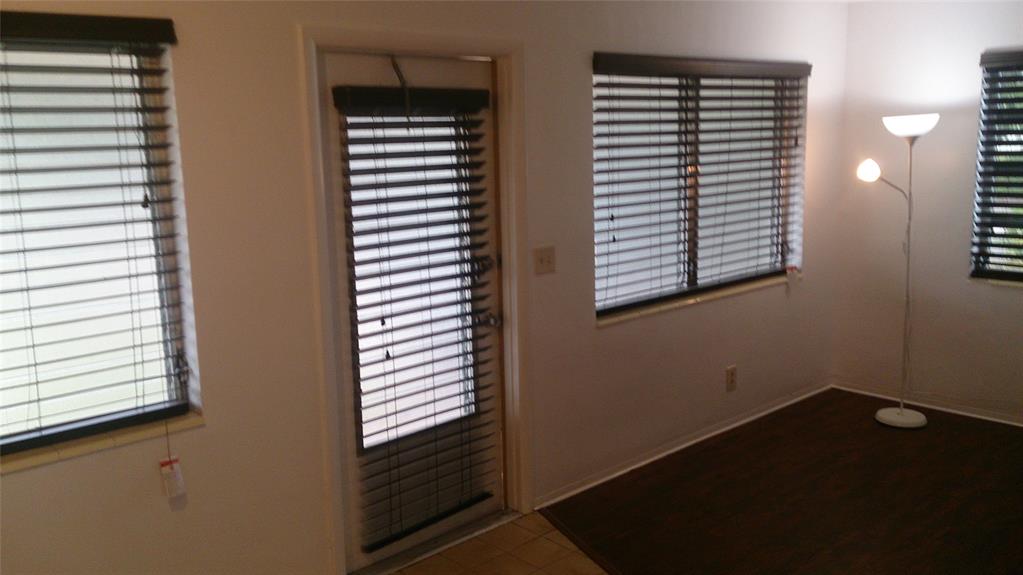 803 Northeast 8th Street Hallandale Beach, FL 33009 - Photo 29 of 38 a view of a room that has a window