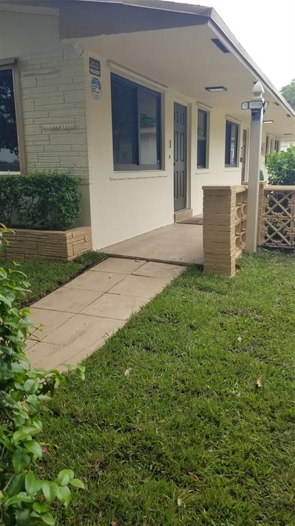 803 Northeast 8th Street Hallandale Beach, FL 33009 - Photo 38 of 38 a view of a house with a garden